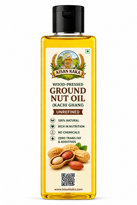 Bottle of Kisan Kaka wood-pressed groundnut oil on a white background