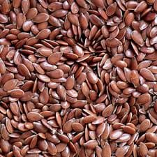 Close-up of a pile of brown flaxseeds
