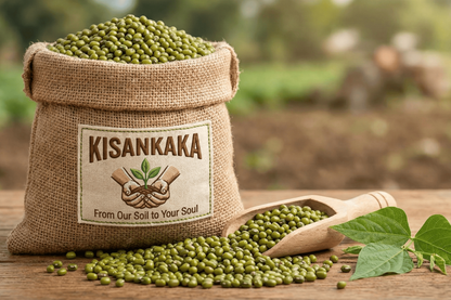 Sack of green beans with 'Kisankaka' branding on a wooden surface with a blurred natural background.