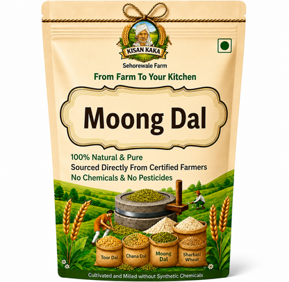 A stand-up pouch of Kisan Kaka Farm Moong Dal on a plain white background. The packaging is primarily beige with a green illustration of a farm scene at the bottom, showing mounds of dal, wheat, and a traditional stone grinder.