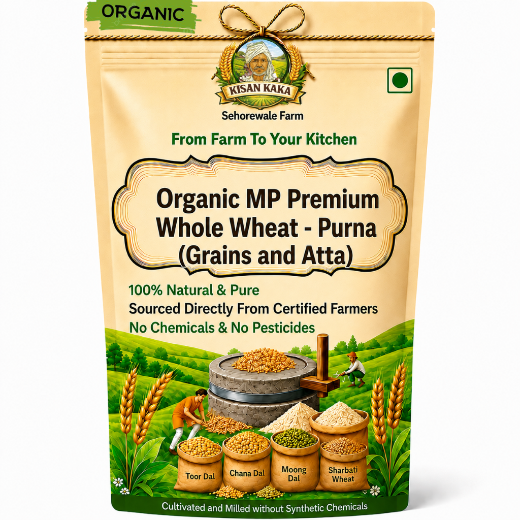 A stand-up pouch of Kisan Kaka Farm Organic MP Premium Whole Wheat - Purna (Grains and Atta) on a plain white background. The packaging is beige with green accents, featuring a logo, product name, and illustrations of wheat, farmers, and a stone grinder.